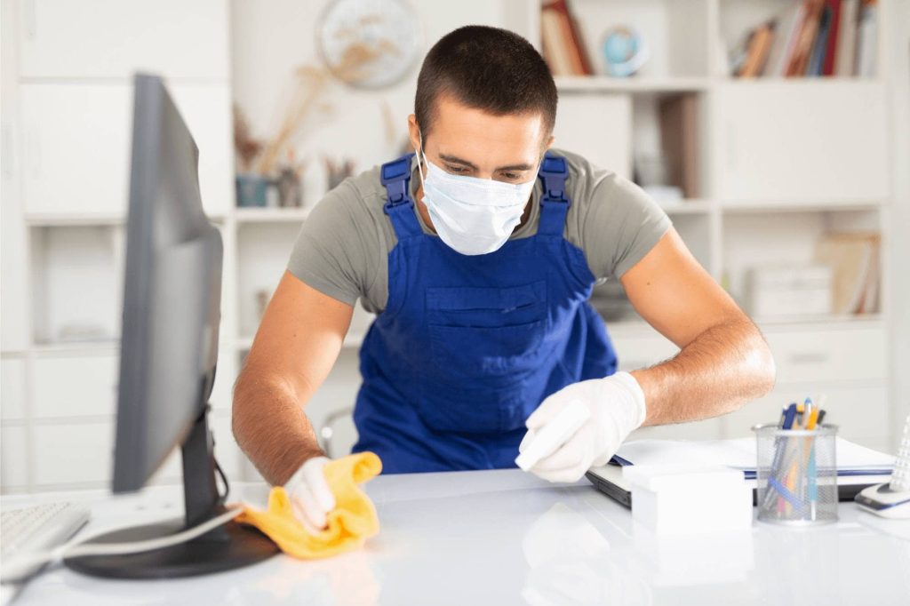 cleaning wooden furniture in the office