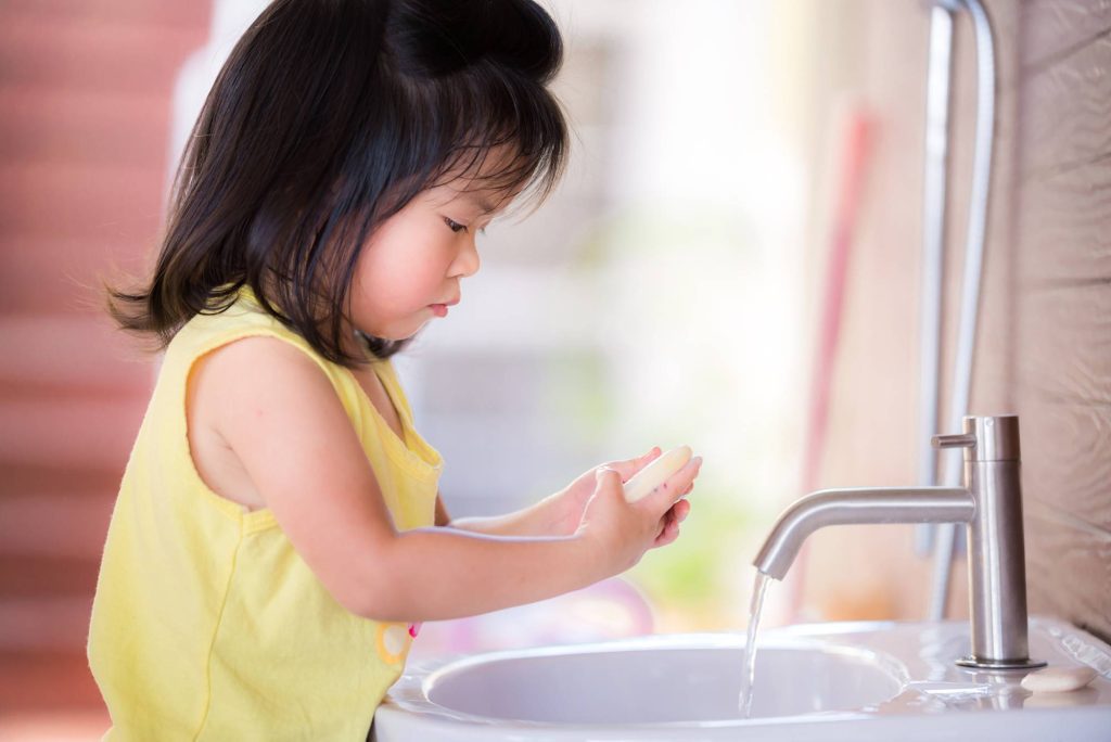 cleaning children's restrooms in a daycare center