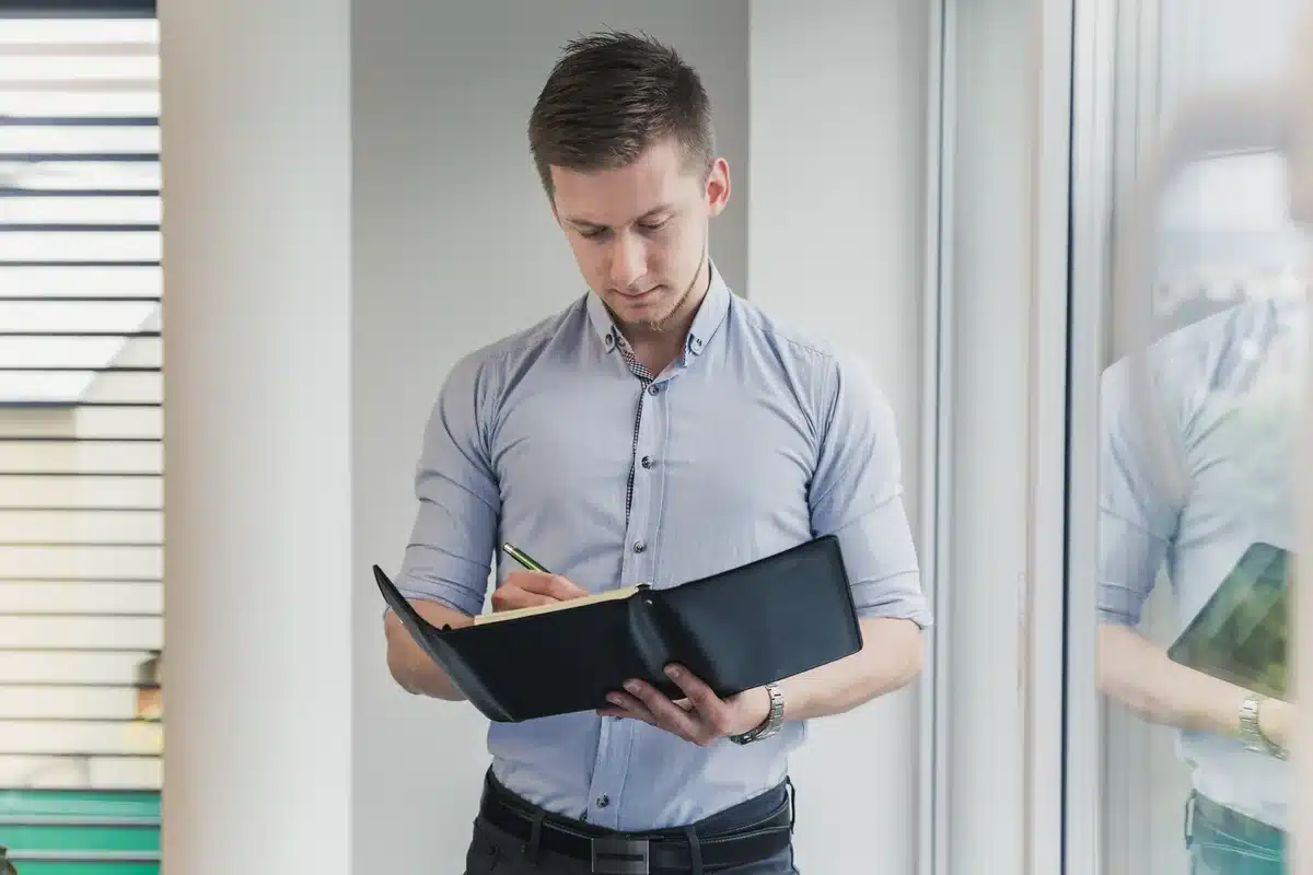 Business professional reviewing notes in an office