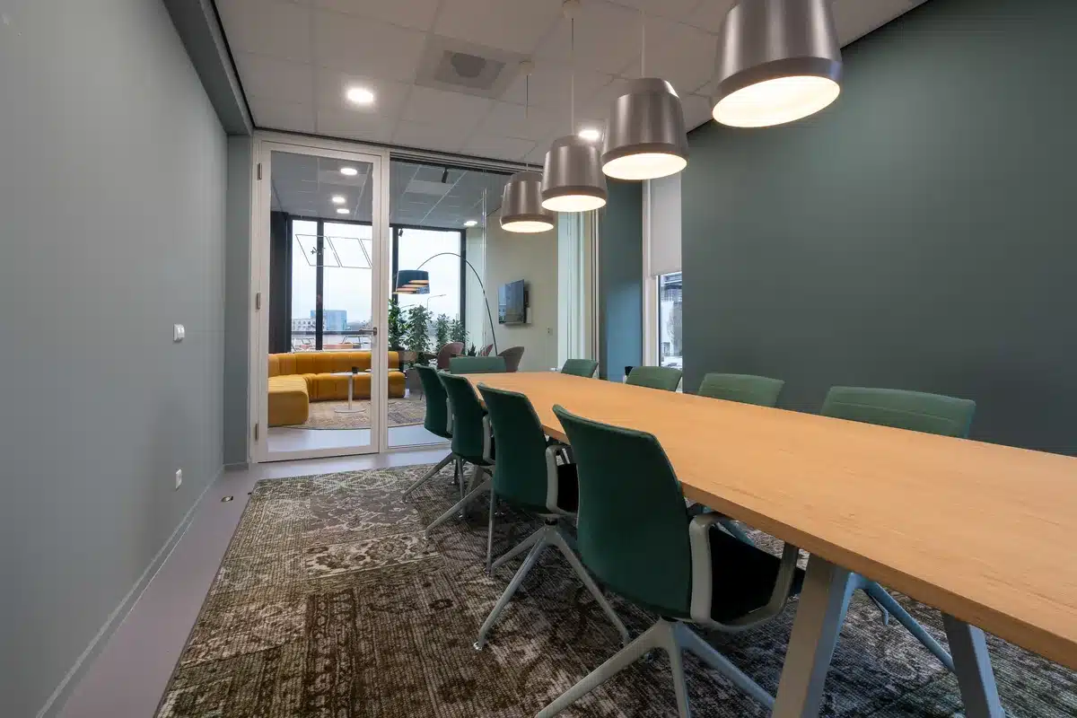 Meeting room with chairs and a patterned carpet