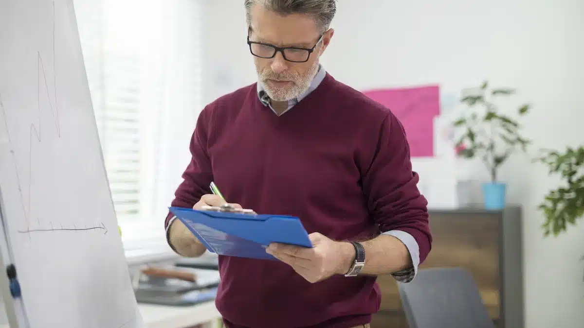 Business professionals reviewing documents at a table
